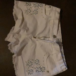 White Jordache Jean shorts with embroidery.
